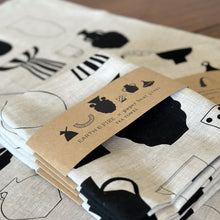 Load image into Gallery viewer, Earth & Fire tea towel - oatmeal/black