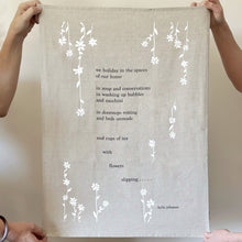 Load image into Gallery viewer, tea towel - with flowers slipping poem - flax/black/white