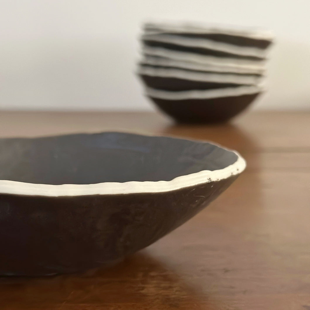 black and cream porcelain bowl