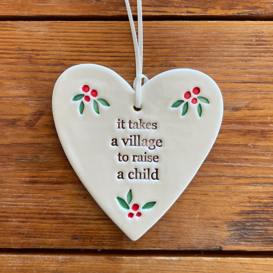 it takes a village to raise a child heart ornament